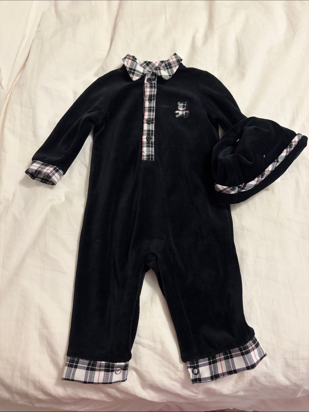 Little Me Black One-Piece with Plaid Trim and Matching Hat